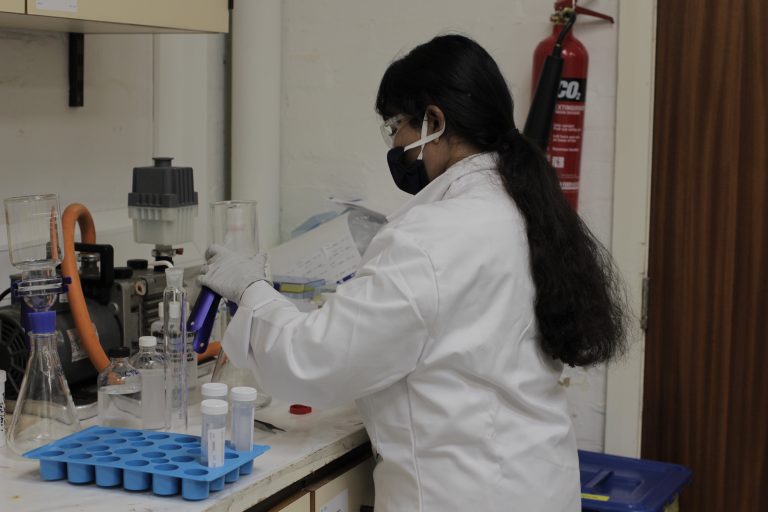 working in the lab on biocides