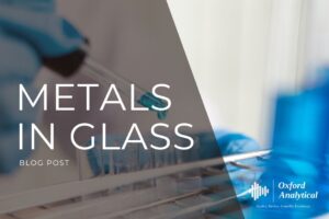 metals in glass page banner image containing test tubes background with the page title overlayed